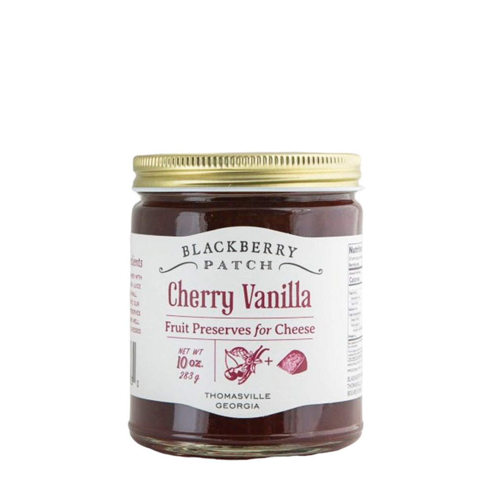 10oz glass jar of Blackberry Patch Cherry Vanilla Fruit Preserves for Cheese with gold screw on lid. 