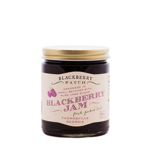 10oz jar of Blackberry Patch Blackberry Jam with gold screw on lid. 