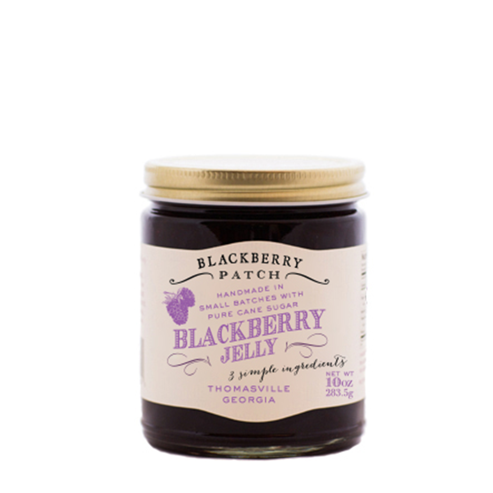 10oz jar of Blackberry Patch Blackberry Jelly with gold screw on lid. 