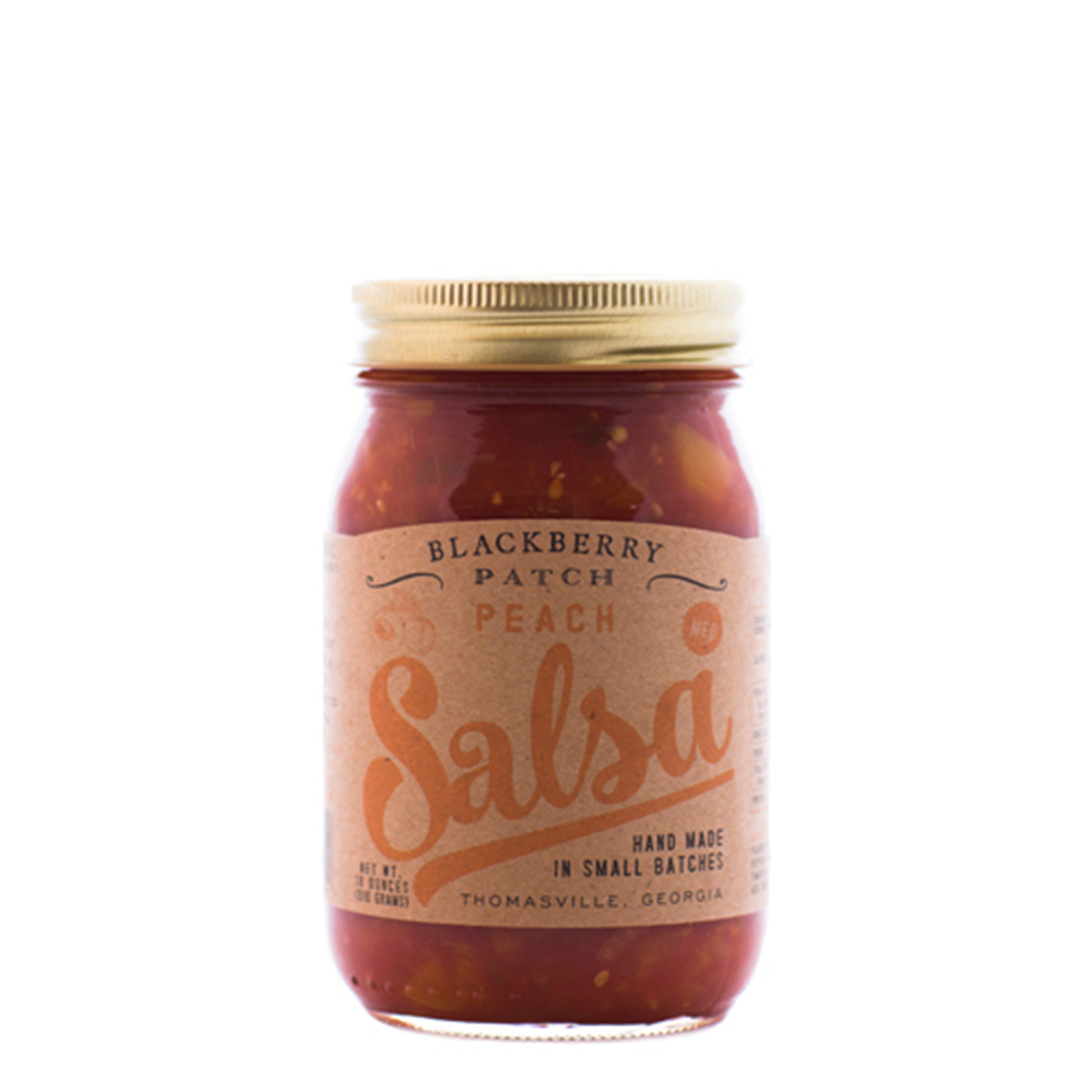 17oz jar of Blackberry Patch Peach Salsa with gold screw on lid. 
