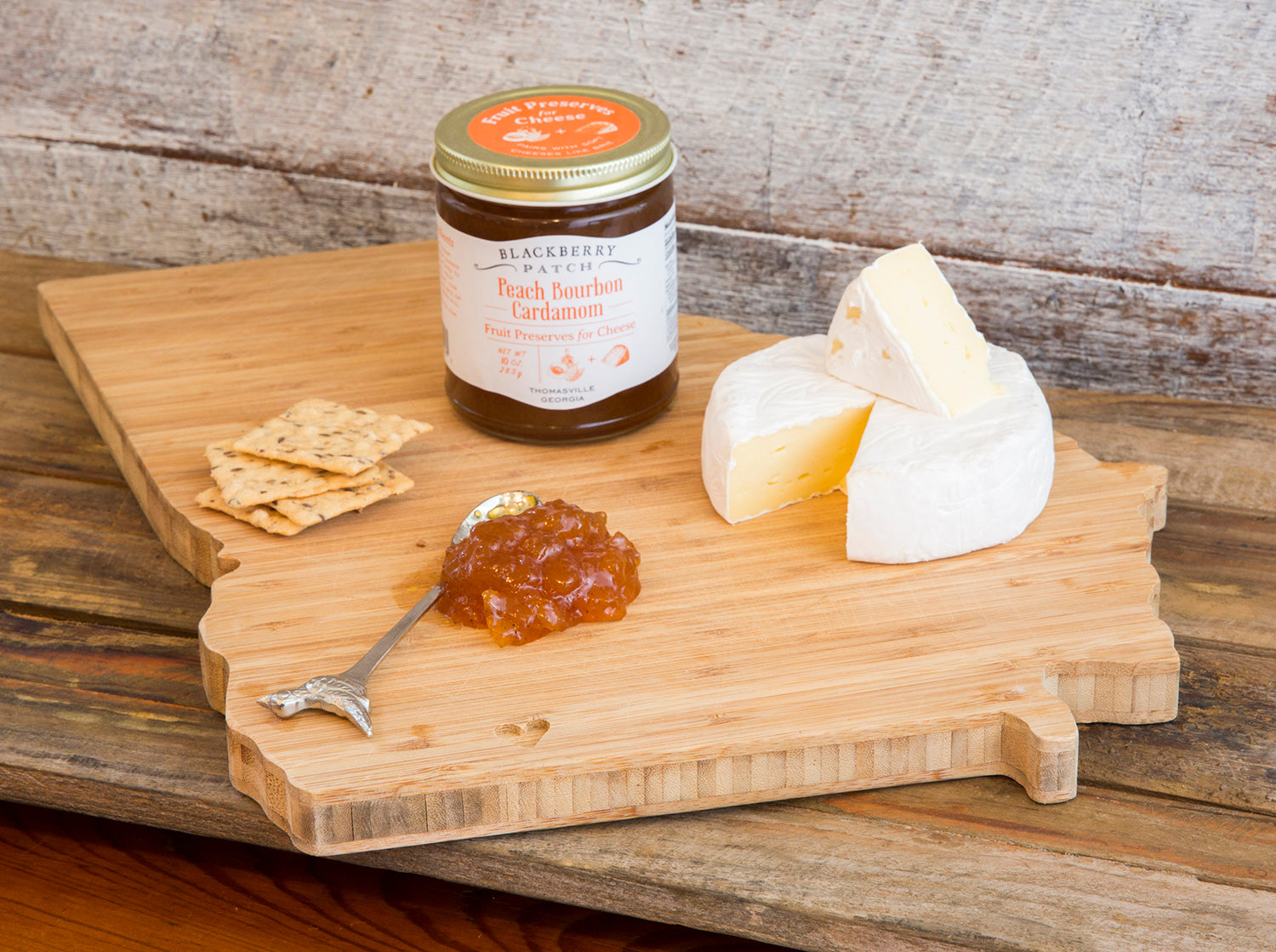 Photo of Peach Bourbon Cardamom Fruit Preserves for Cheese paired with a soft cheese like brie.